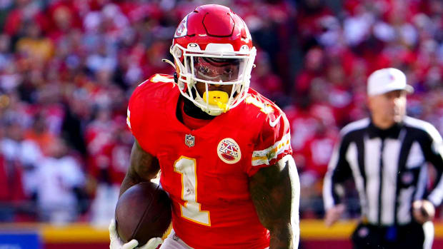 Jerick McKinnon runs the football